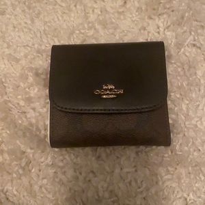 Brown and black Coach wallet